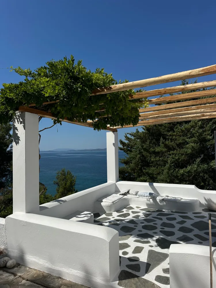 Whitewashed pergola terrace with a sea view